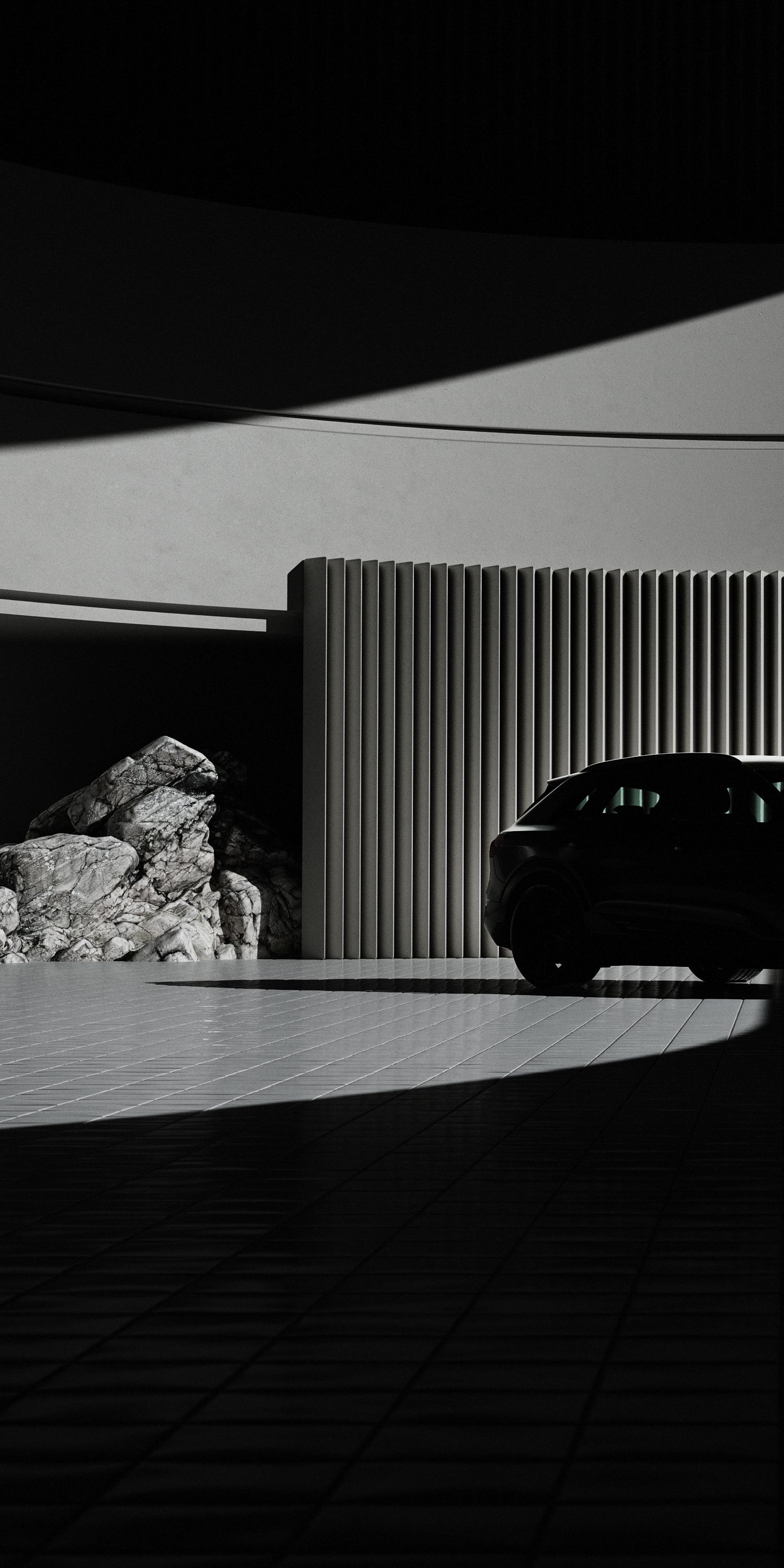 Car in front of a wall