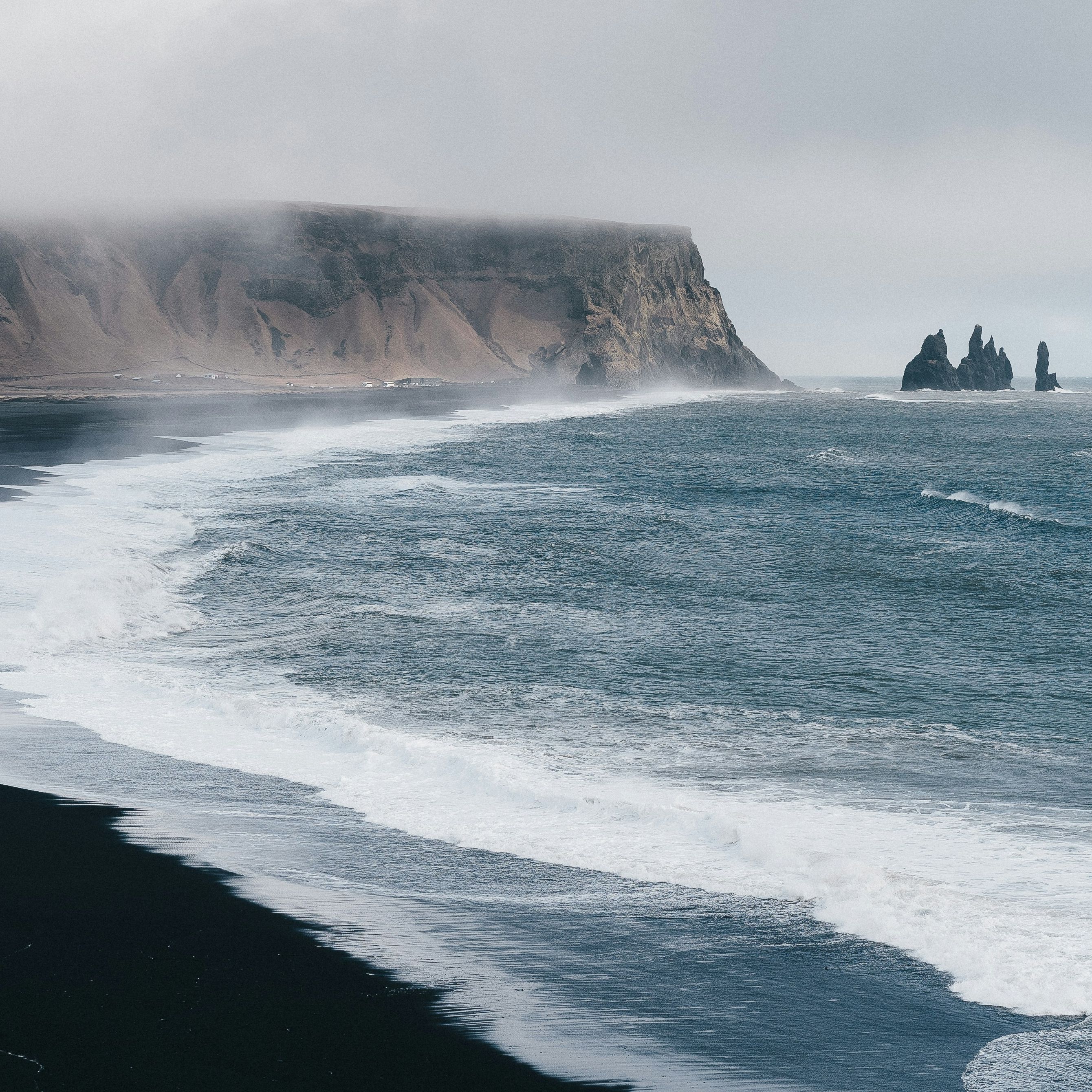 Beach with cloudy sky