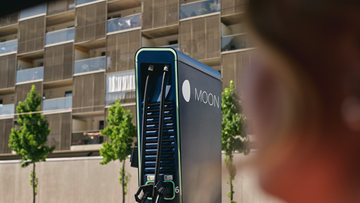 Fast charging station in front of a street