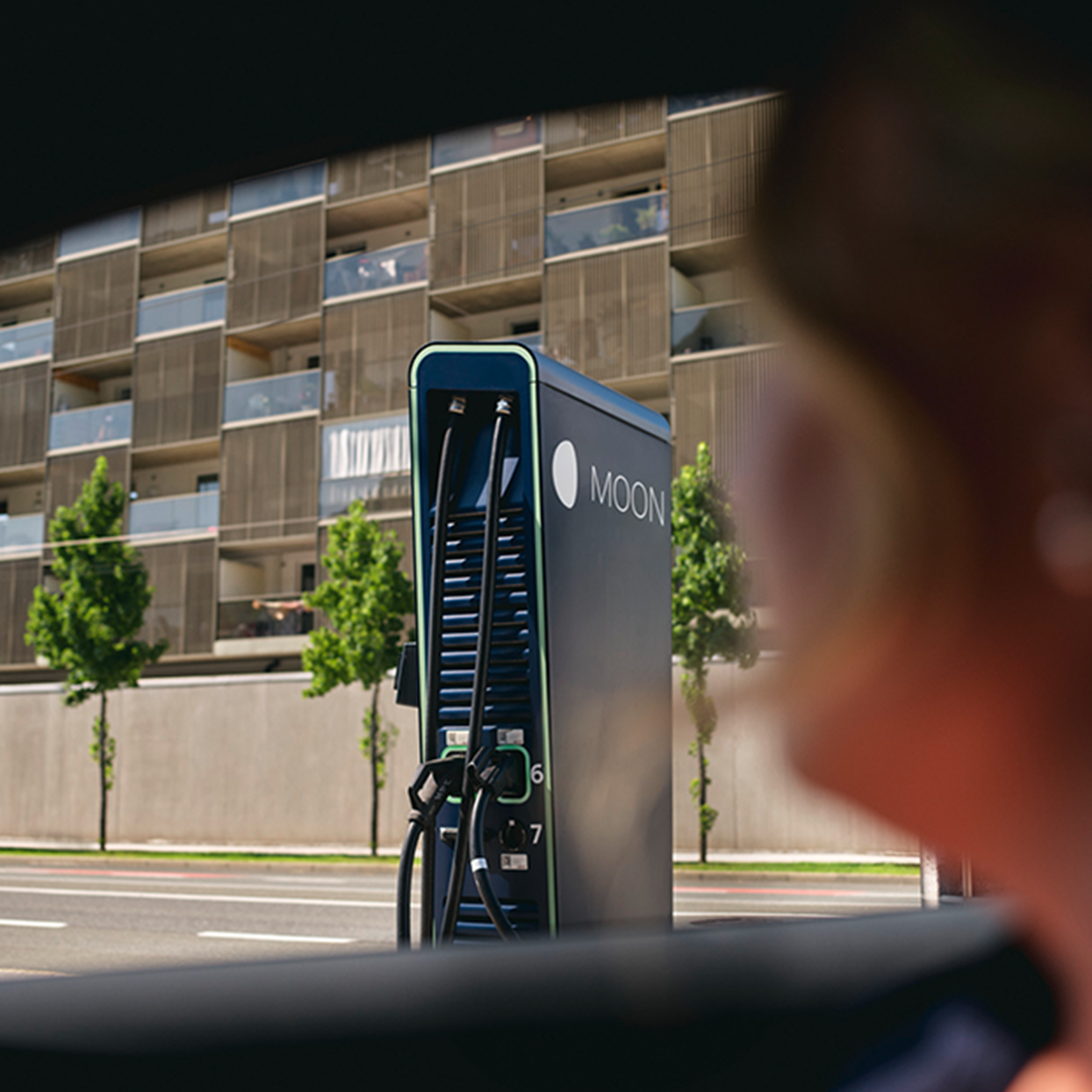 Fast charging station in front of a street