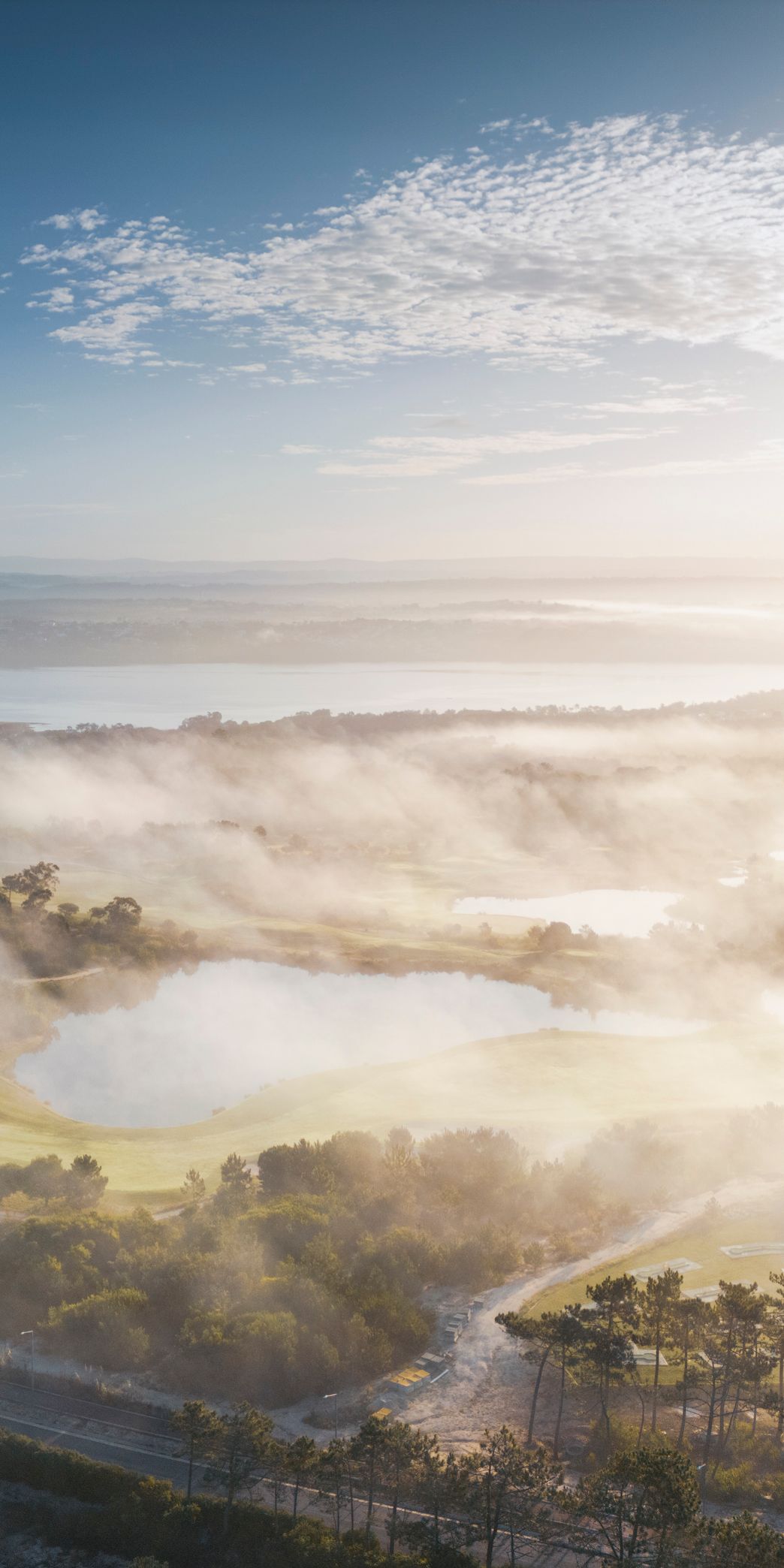 Landscape with lakes and clouds